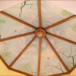 circular false wood and glass ceiling for bedroom