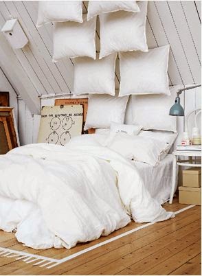 single bed headboard ideas - cushions from bed to ceiling