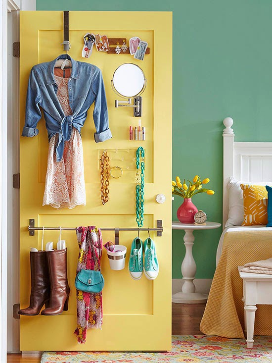 closet cabinet doors as storage solution for women's bedroom